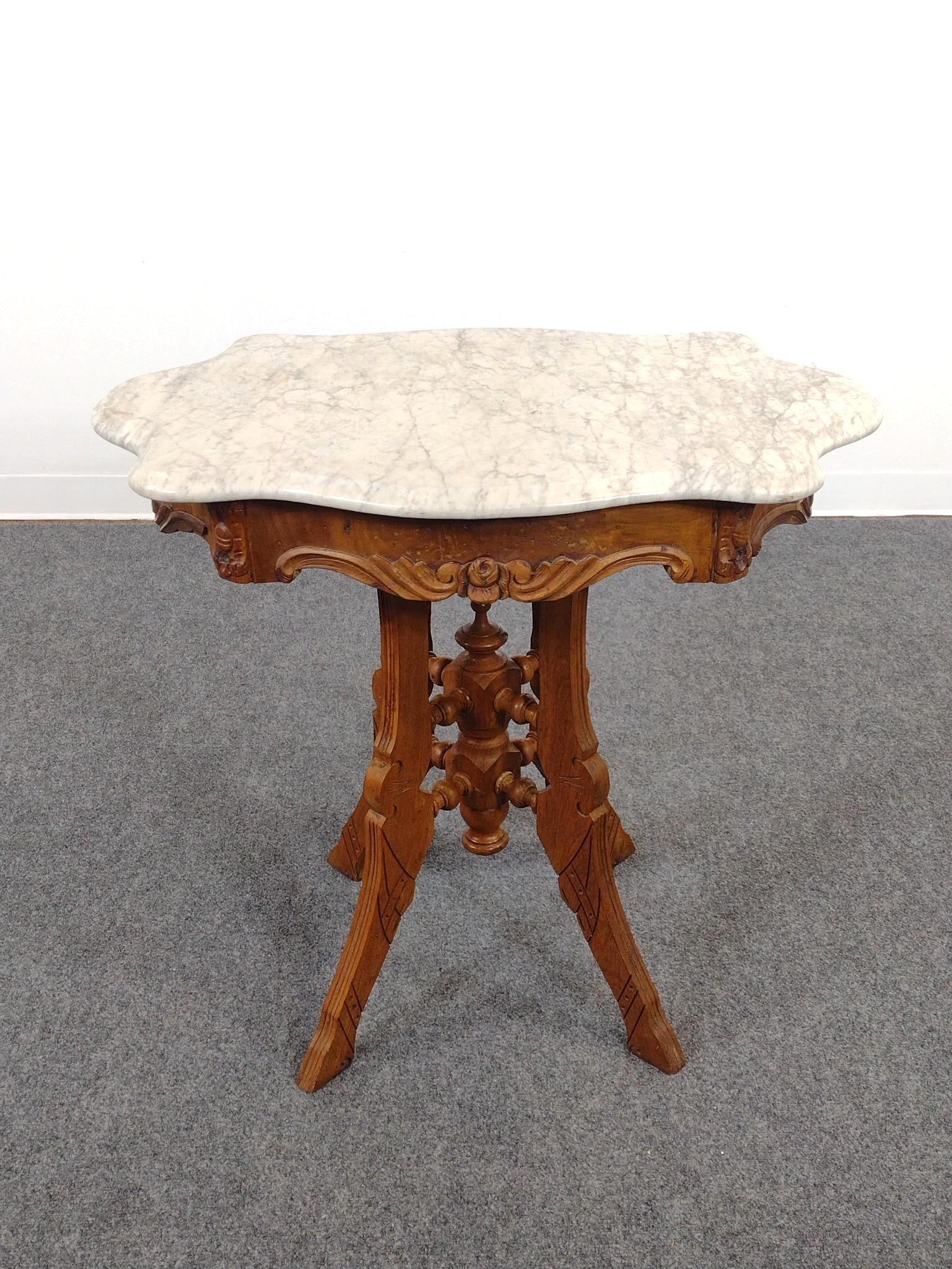 Victorian Marble Turtle Top Parlor Table: 31-1/2" wide X 22" deep X 29-1/2" high.