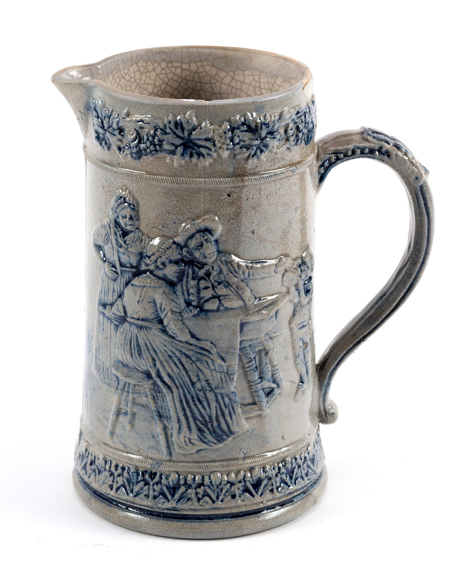 Antique Stoneware Pitcher: Cobalt blue salt glaze with scenes and figures. Has a crack in the rim and a chip in the same area. Measures 8" x 9 - 1/2" x 8".