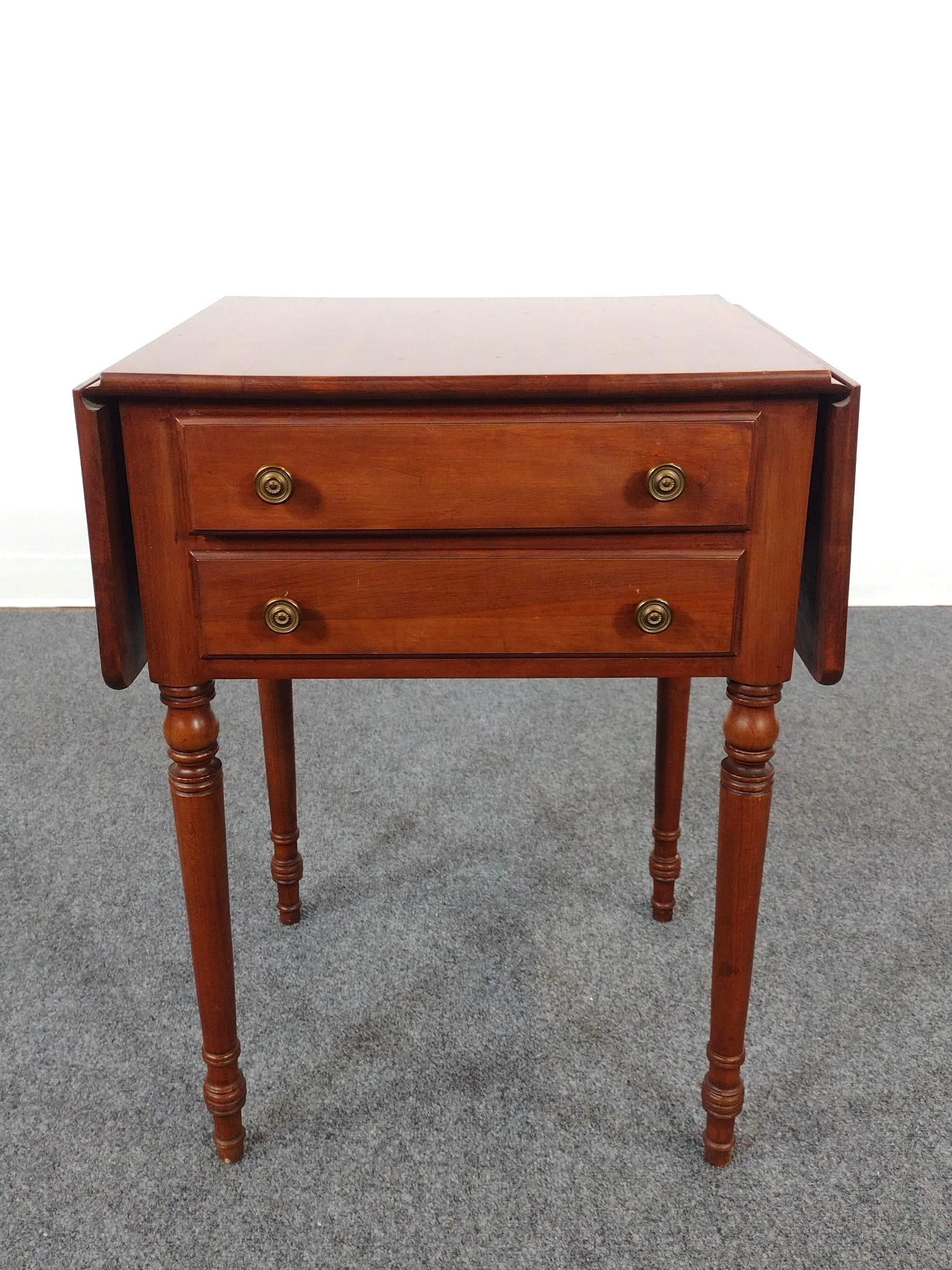 Willett Cherry Two Drawer Drop Side Work Table: Open 37", closed 20-1/2" wide X 17" deep X 27-1/2" high. Has a few light scratches.