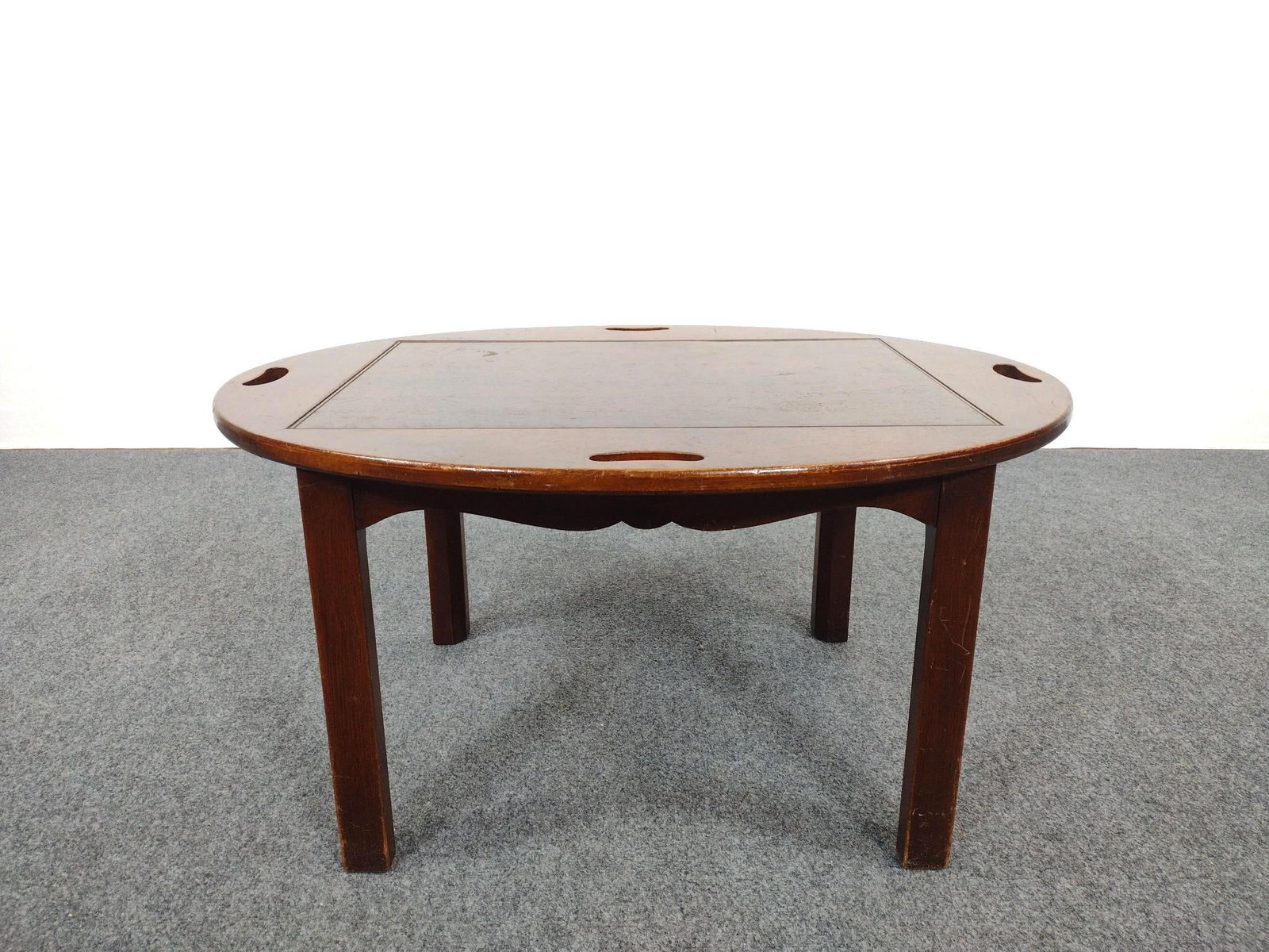 Tray Top Coffee or Tea Table: 34-1/4" wide X 26-1/4" deep X 17" high. Has some scratches and areas of finish loss. Sides do not fold.