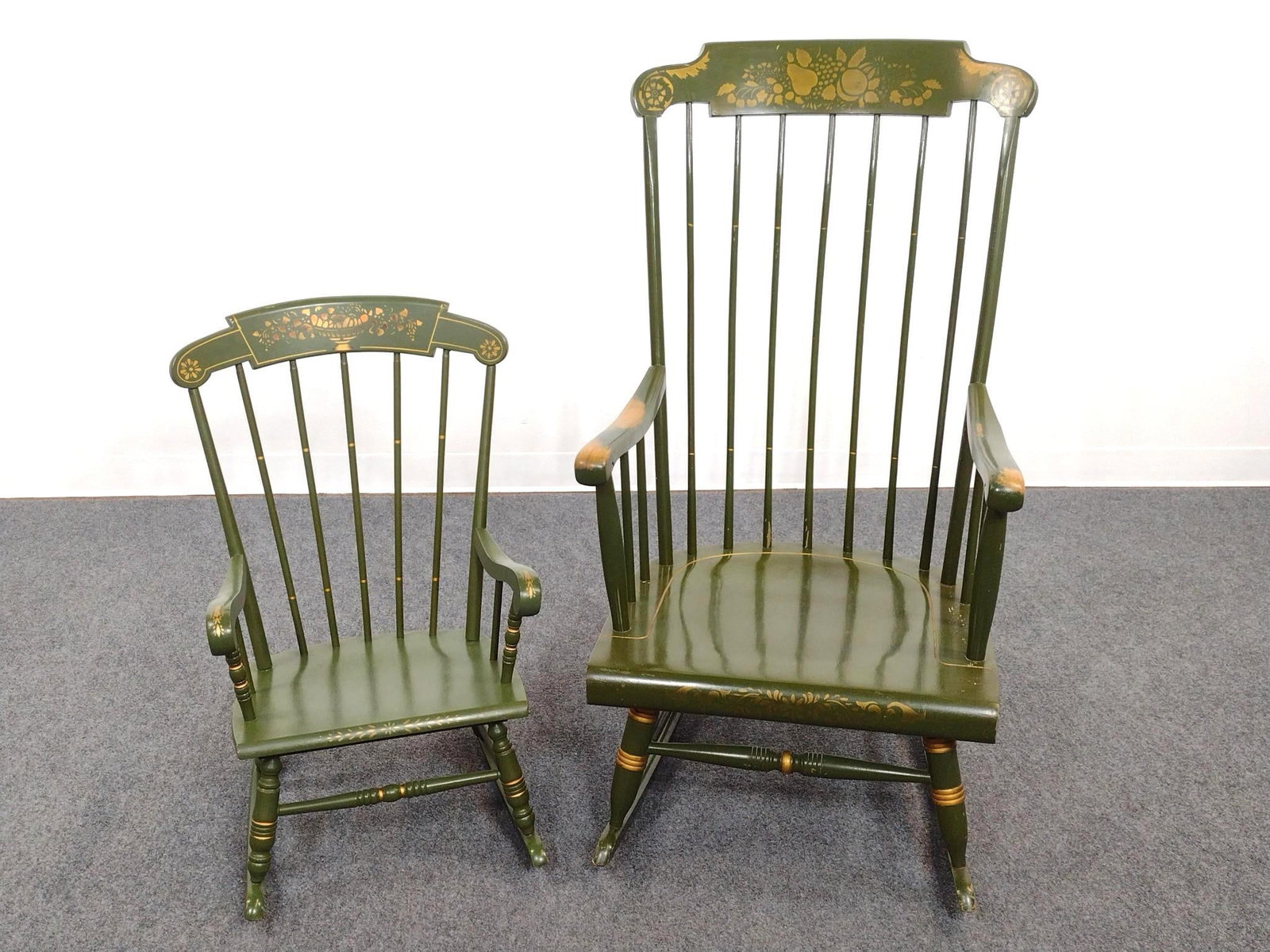 2 Stencil Painted Rockers: Large 21-1/4" wide X 28-1/2" deep X 43" high. Small 17" wide X 21-3/4" deep X 29-1/2" high. Both have some scratches. No manufactures name found.