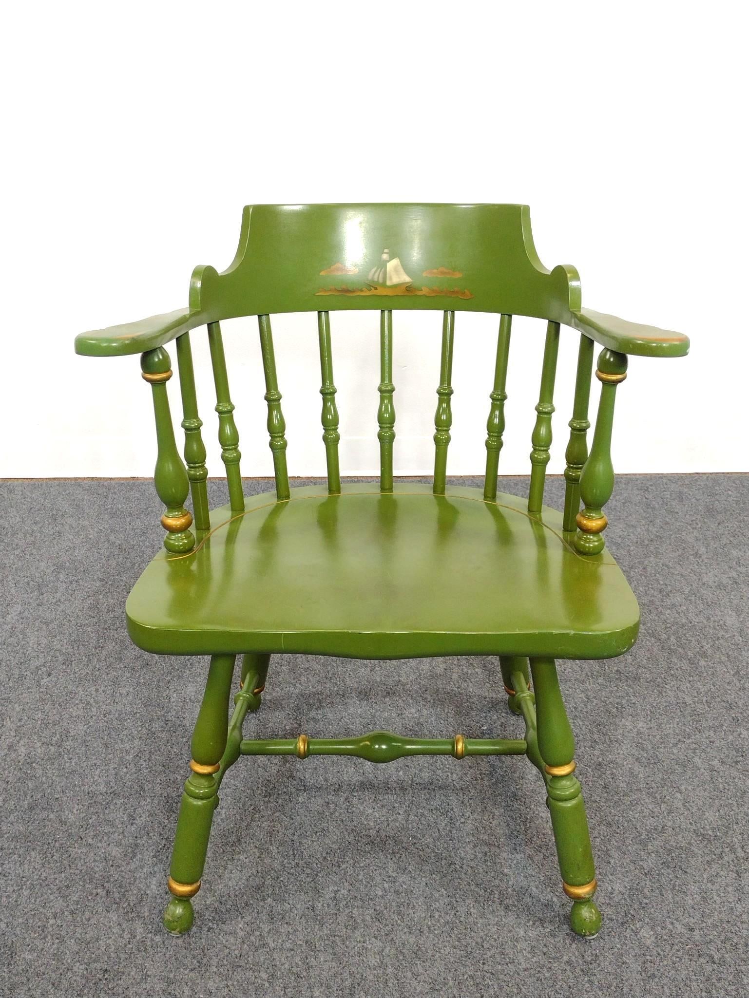 Green Stencil Painted Hitchcock Style Arm Chair: Maritime scene and gold accents. 25-3/4" wide X 17-1/2" deep X 32" high. No manufactures name found.