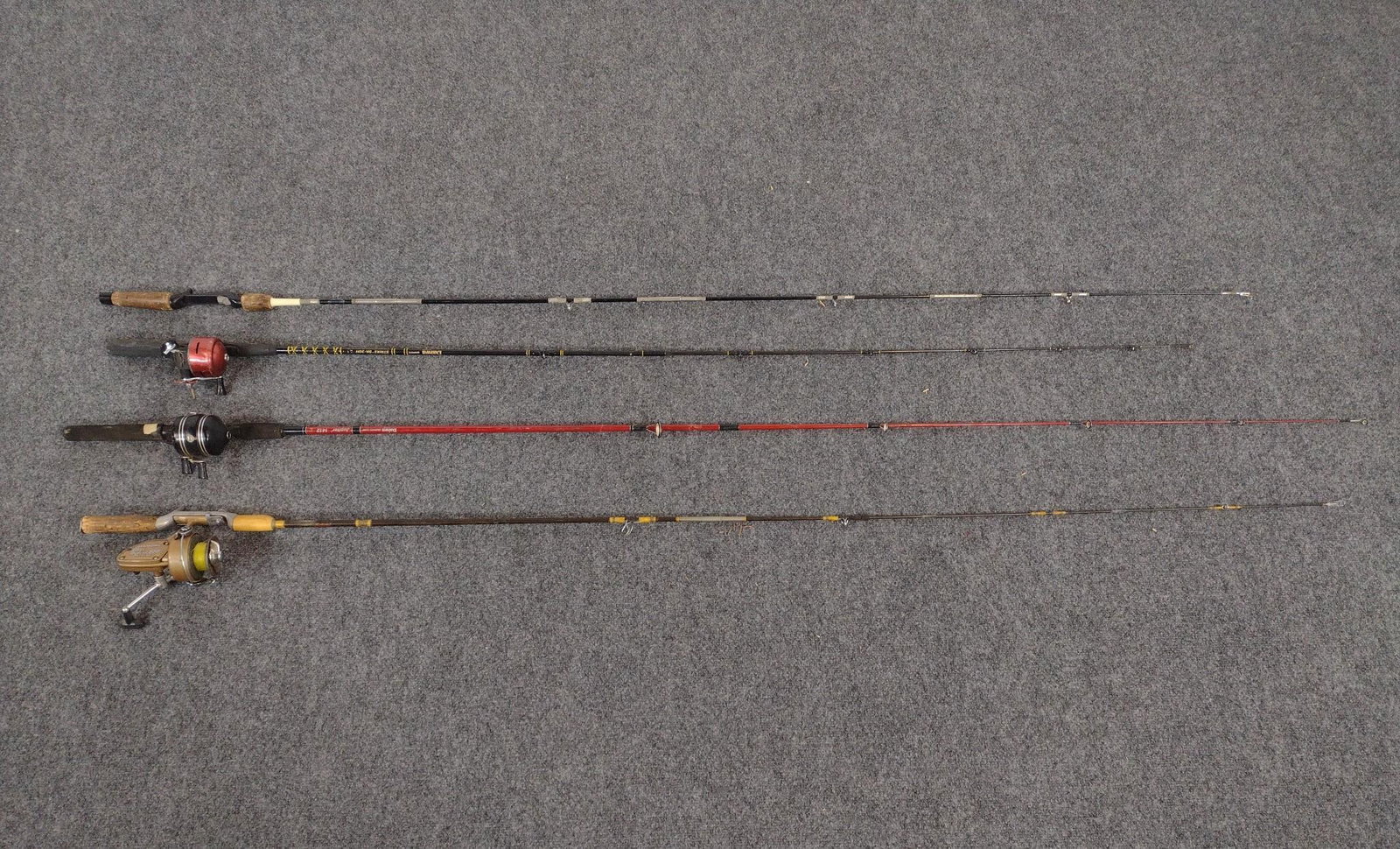 4 Vintage Fishing Rods: Includes a Daiwa Graphite Regal Strike SK-30H fishing rod, a vintage Bristol fishing rod with a Diamond Super Delux 888 reel, a vintage Zebco fishing rod, and a Daiwa Jupiter 1412 fishing rod. 67" to 