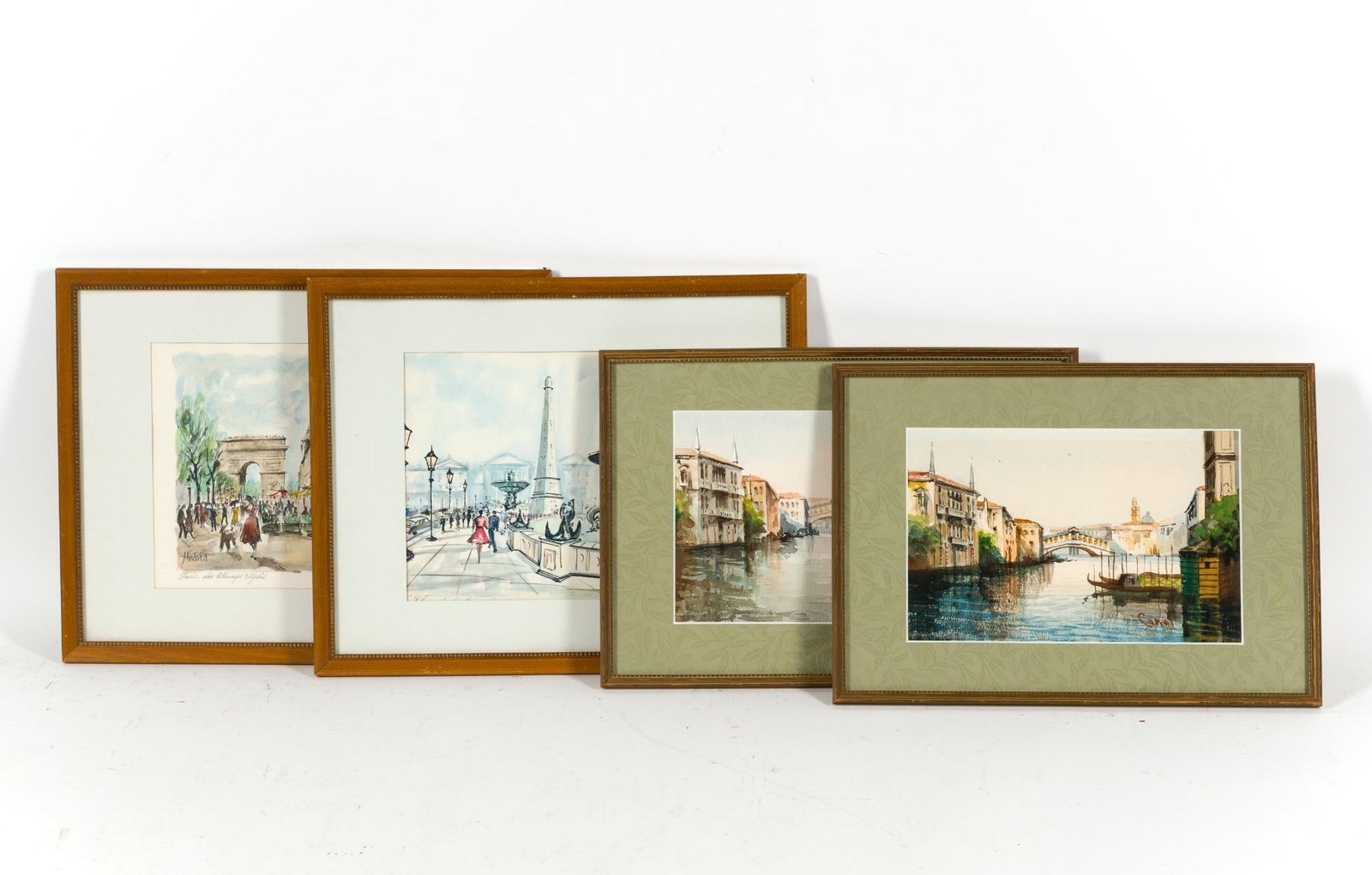 4 Vintage Prints: 1) Vintage hand-colored lithograph titled "Paris. Les Champs Elysees" by Franz Herbelot. 12" x 15". 2) Vintage hand-colored lithograph of Paris. 12" x 15". 3) Vintage watercolor print depicting the