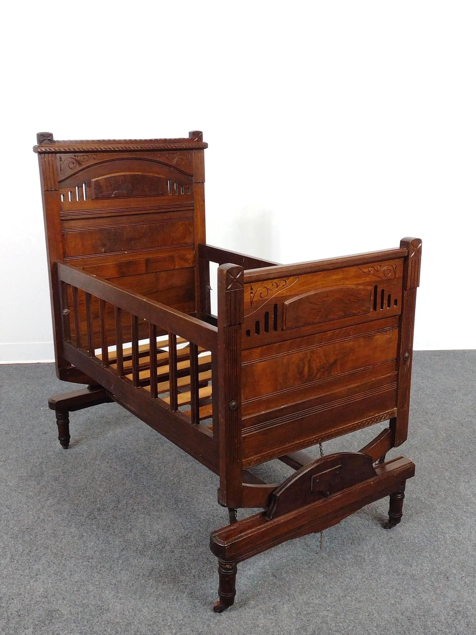 Victorian Eastlake Style Cradle: 26" wide X 43" deep X 43-1/4" high.