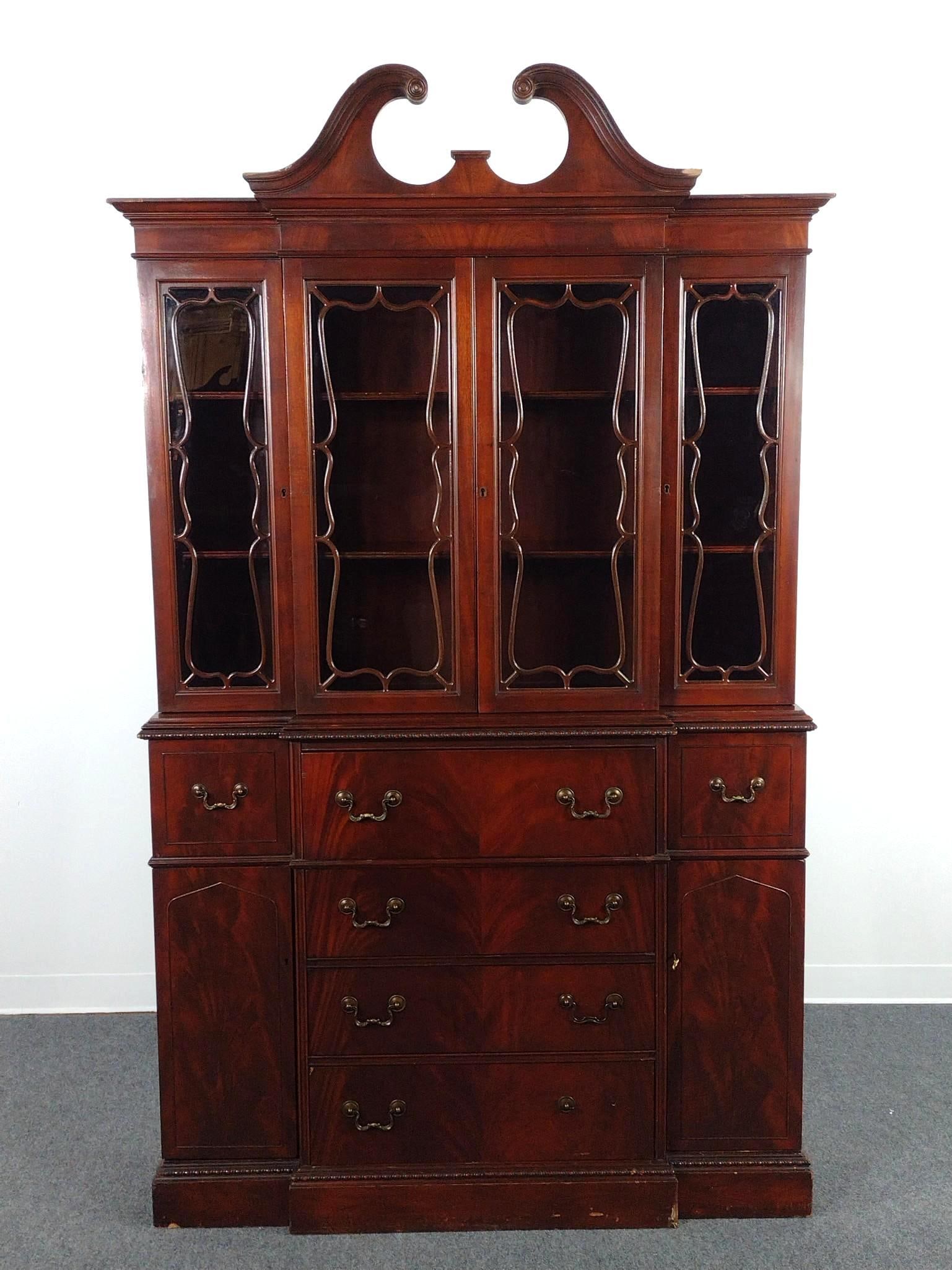 Breakfront China Cabinet: 49" wide X 15-1/2" deep X 83" high. Has some light scratches and areas of finish loss.