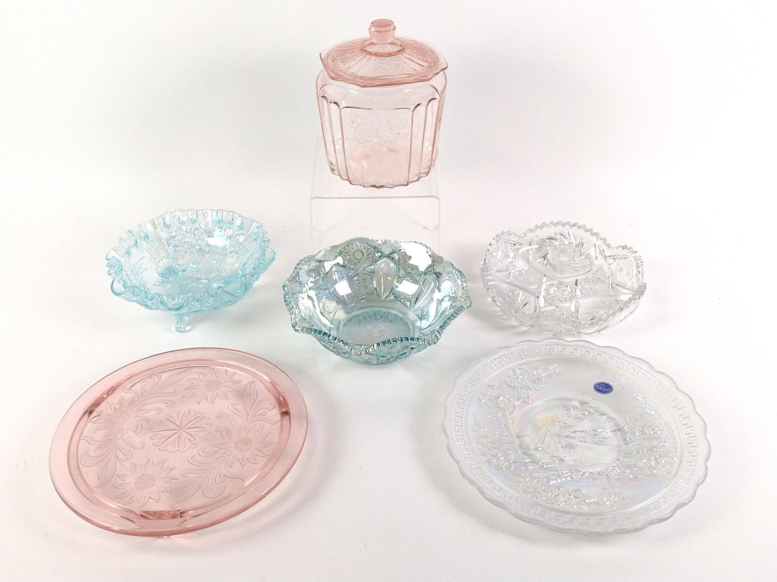 Carnival & Depression Glass: Includes an Imperial White Homestead Chop Plate that has a diameter of 10 - 1/4", a Jeanette Glass "Sunflower" pattern footed cake plate 10" in diameter, L.E. Smith company blue "Comet in the Stars" c
