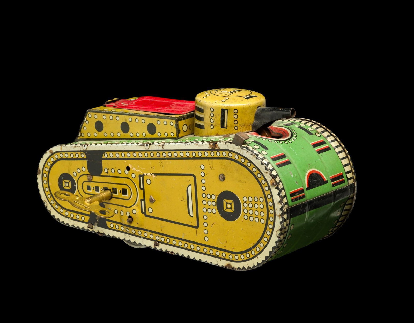 Antique Marx Doughboy Wind-up WWI Tin Plate Tank: Works with the original key, features a dough boy soldier. Measures 4" x 5 - 1/2" x 10".