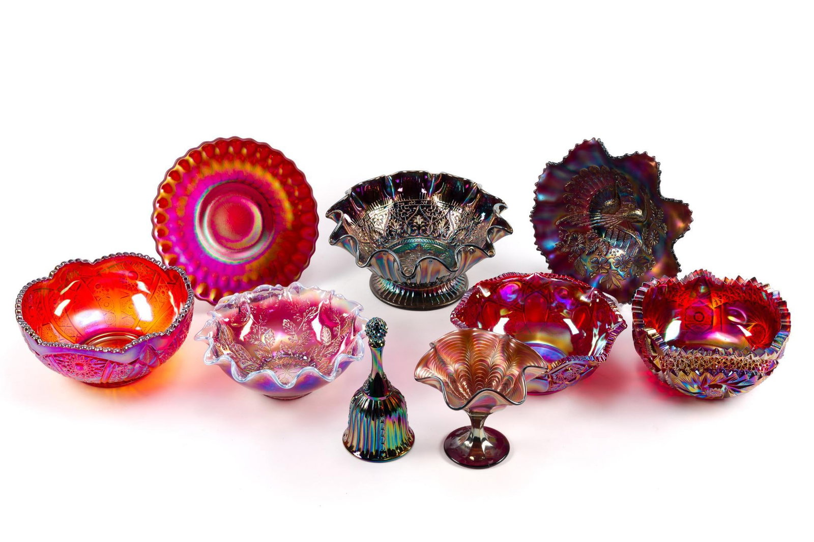 9 Pieces of Carnival Glass: Includes L.E Smith, Indiana Glass and more. Largest piece measures 8 - 1/2" x 4" x 8 - 1/2".
