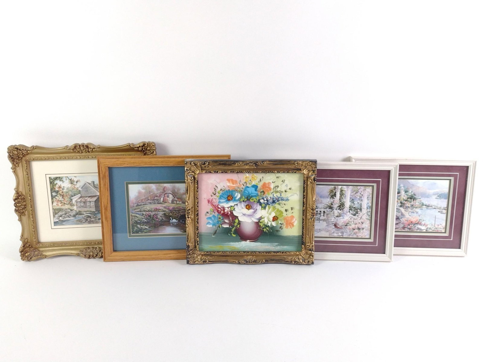 5 Pieces of Framed Art: 1) Marilyn Simandle "Catalina Bay". 8 - 3/4" x 10 - 3/4". 2) Marilyn Simandle "Seaside Walkway". 8 - 3/4" x 10 - 3/4". 3) Unsigned floral still life oil painting on Samsonite. 9 - 1/4" x 12 - 1/4". 4)