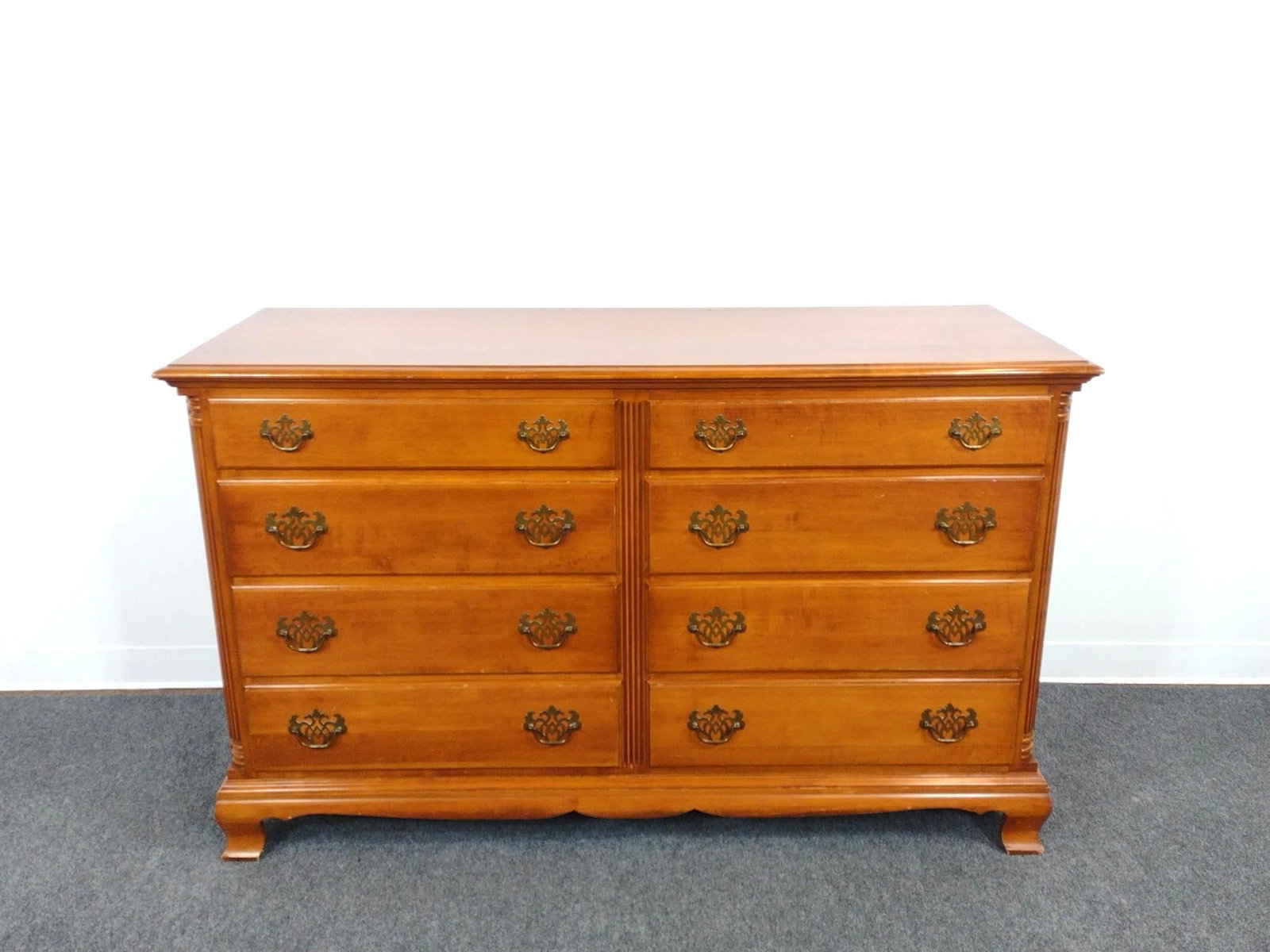 Kling 8 Drawer Dresser: 58" wide X 20-1/4" deep X 35-1/2" high. Has some light scratches.