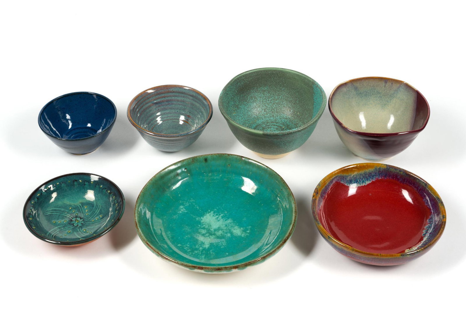 7 Pieces of Signed Art Pottery: Most are from North Carolina. Largest measures 9 - 1/2" in diameter.