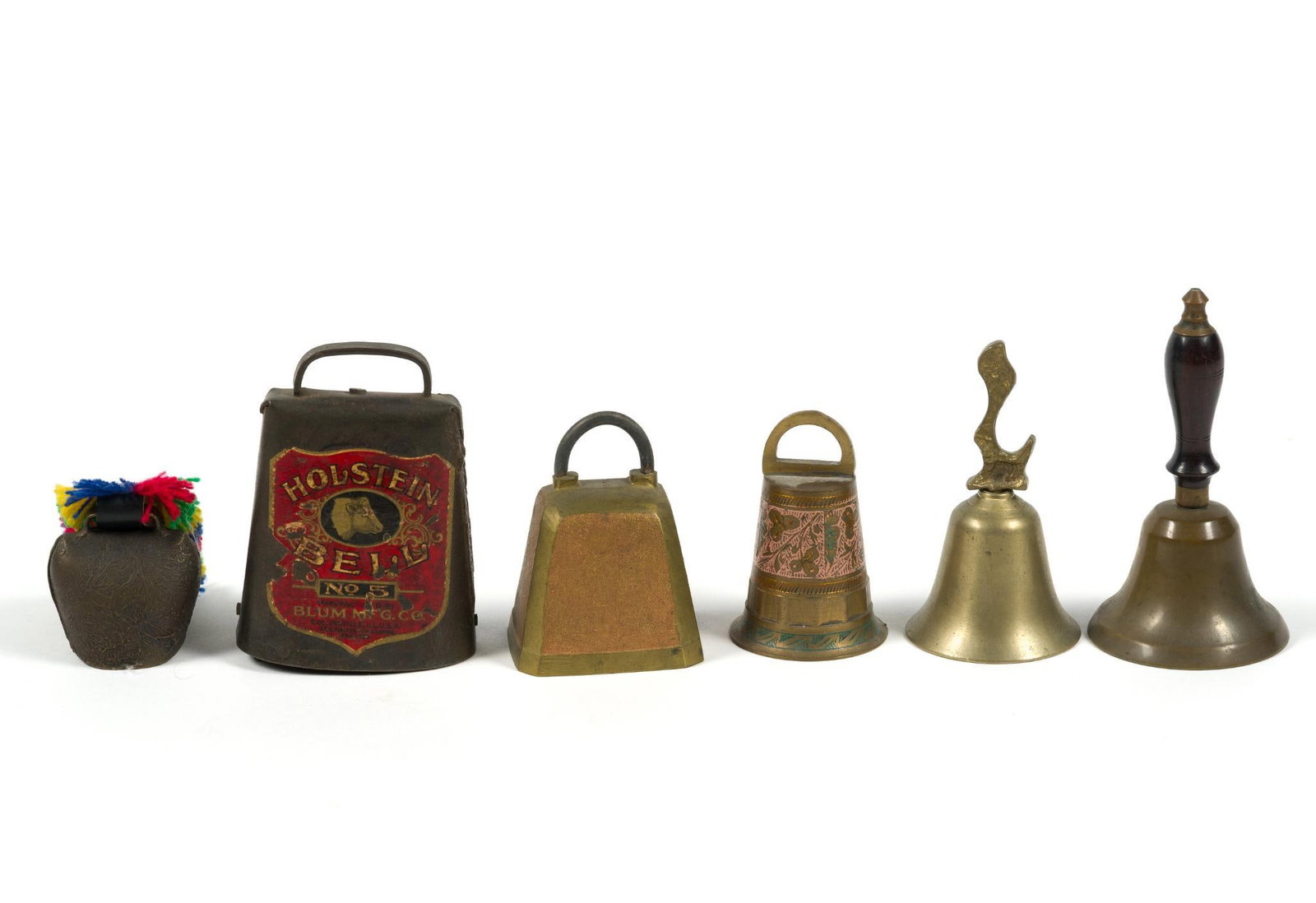 6 Vintage Bells Incl. Holstein Blum MFG. Co.: Includes other brass and copper bells. Blum MFG bell is the largest and measures 3" x 2" x 4 - 1/2".