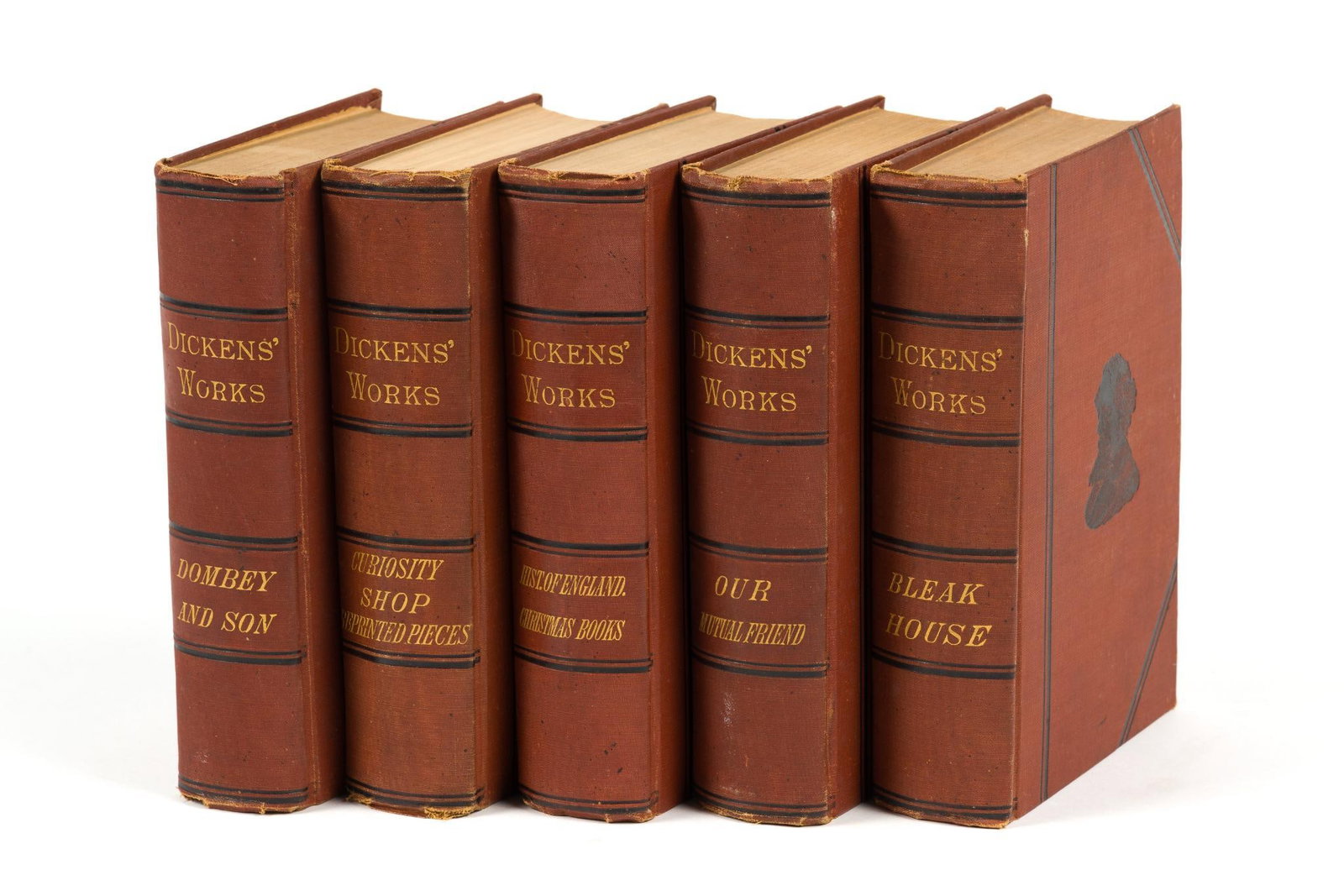 5 Antique Charles Dickens Volumes Incl. Bleak House: From a set published in Boston by DeWolfe, Fiske, & Co. Also includes "Dombey and Son," "Curiosity Shop Reprinted Pieces," "History of England and Christmas Books" and "Our Mutual Friend." Books measu