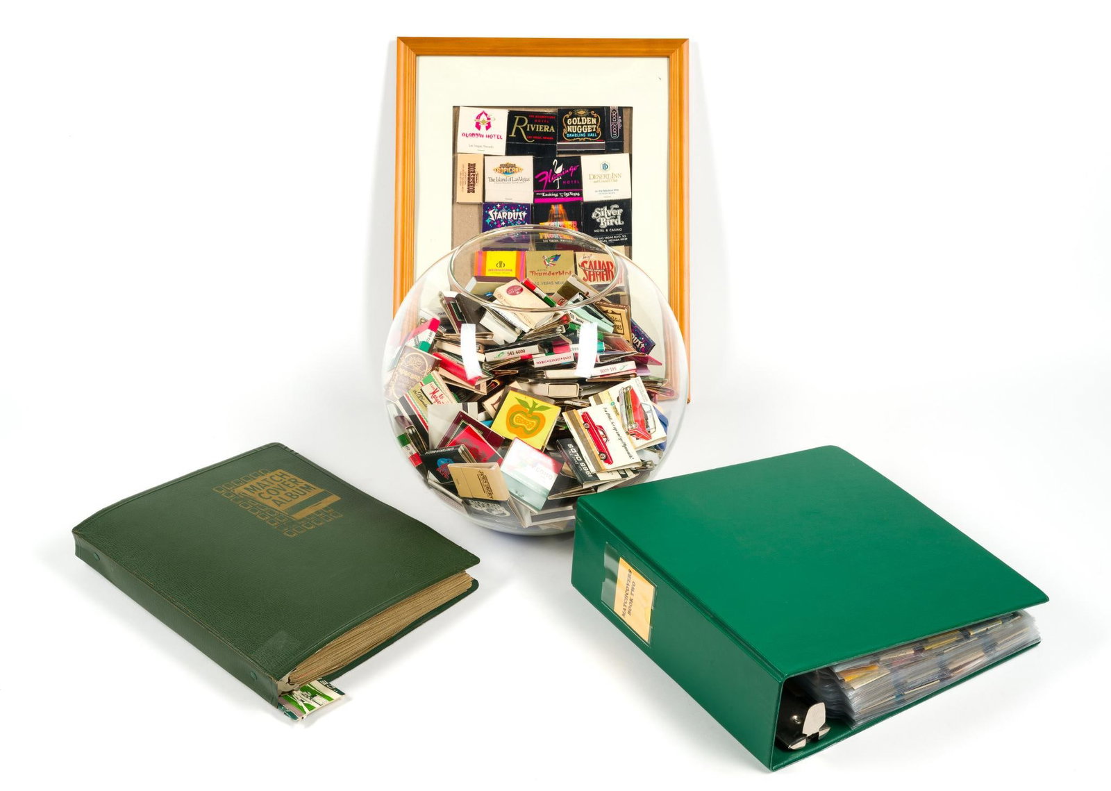 Large Collection of Matchbooks: Fish bowl measures 12" x 10" x 12". Includes matchbooks from casinos, cars, restaurants, hotels and more. Frame measures 15 - 1/4" x 12 - 1/4".