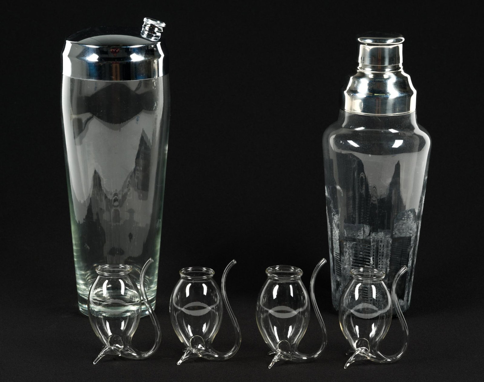 2 Antique Shakers & 4 Port Sipper Glasses: Shakers measure 4" x 10 - 1/2" x 4". Port sipper glasses are specialized, often hand-blown, 17th-century style vessels designed with a built-in tube to drink from the of the glass bottom, minimizing o