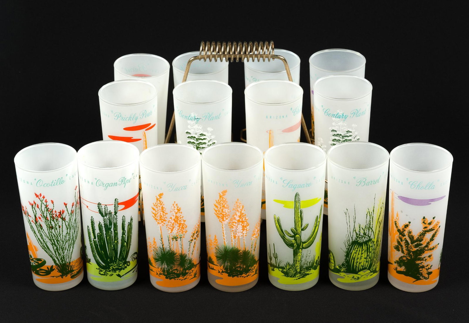 2 Sets of Blakely Oil & Gas Arizona Cactus Frosted Glasses: These frosted glass cups were promotional items given away at Arizona gas stations during the1950's and 1960's. Comes with original wire display and/or carry rack. Glass measures 2 - 3/4" wide and 6 -