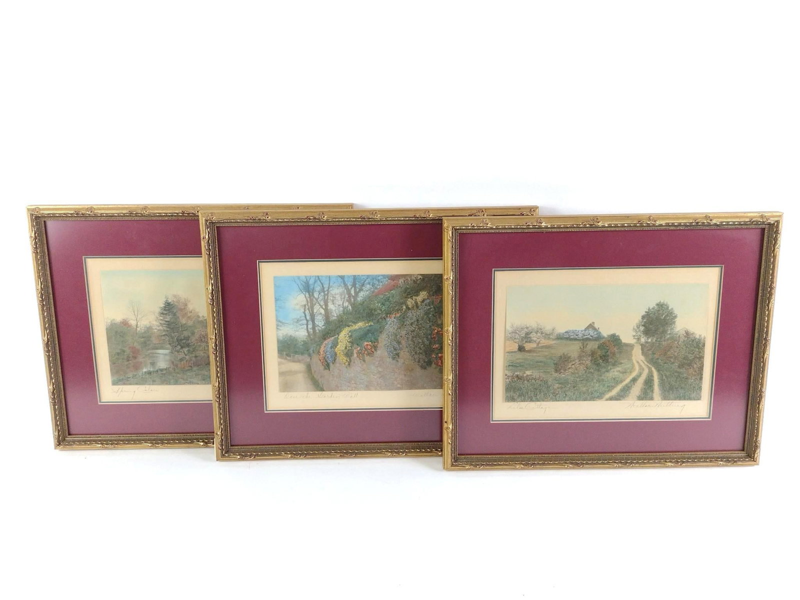 3 Framed Wallace Nutting (1861 - 1941) Hand Colored Photographs: All three signed and framed. All measure 12 - 1/2" x 15 - 1/2". Includes "Over the Garden Wall," "Lilac Cottage," and "Spring Colors."