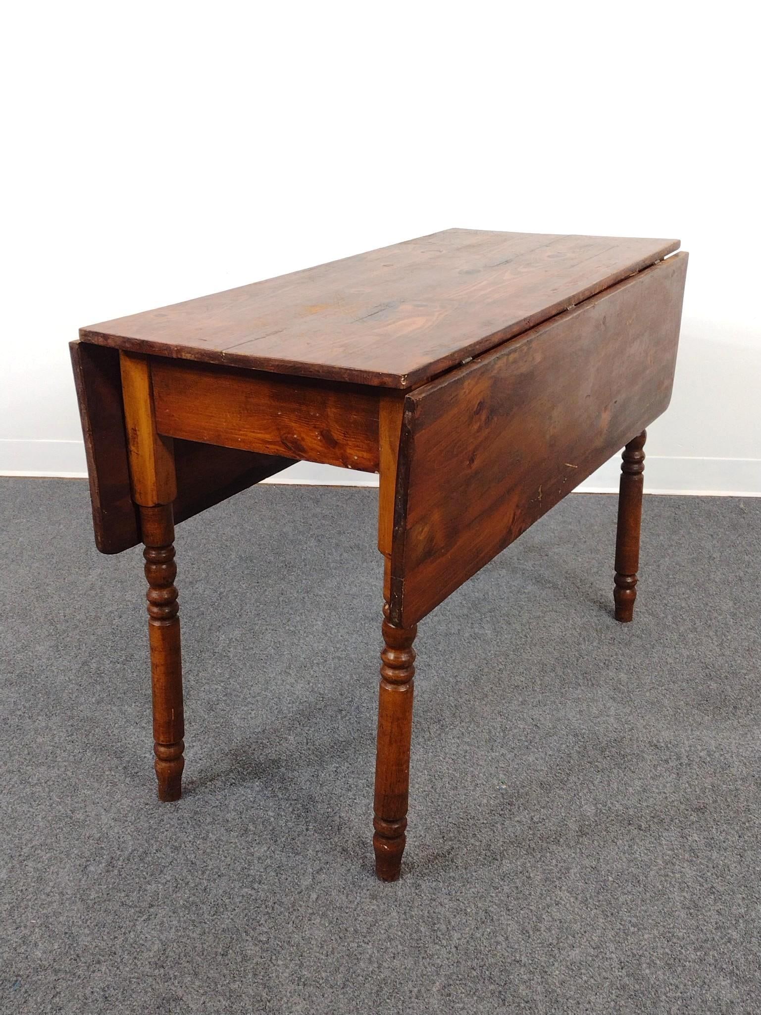 Drop Leaf Dining Table: Open 41-1/2", closed 19-1/2" wide X 42" deep X 29" high. Has scratches and areas of finish loss.