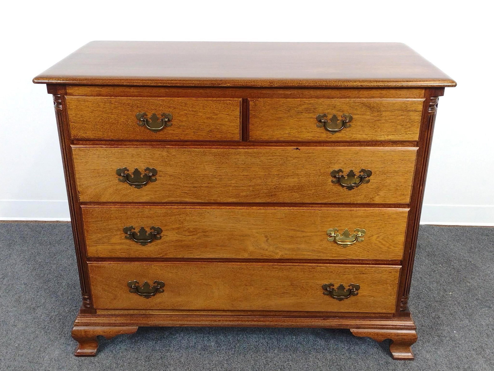 Kling Chippendale Style Low Chest of Drawers: 42" wide X 20" deep X 35" high. Has sun fading. One Drawer pull has been replaced.