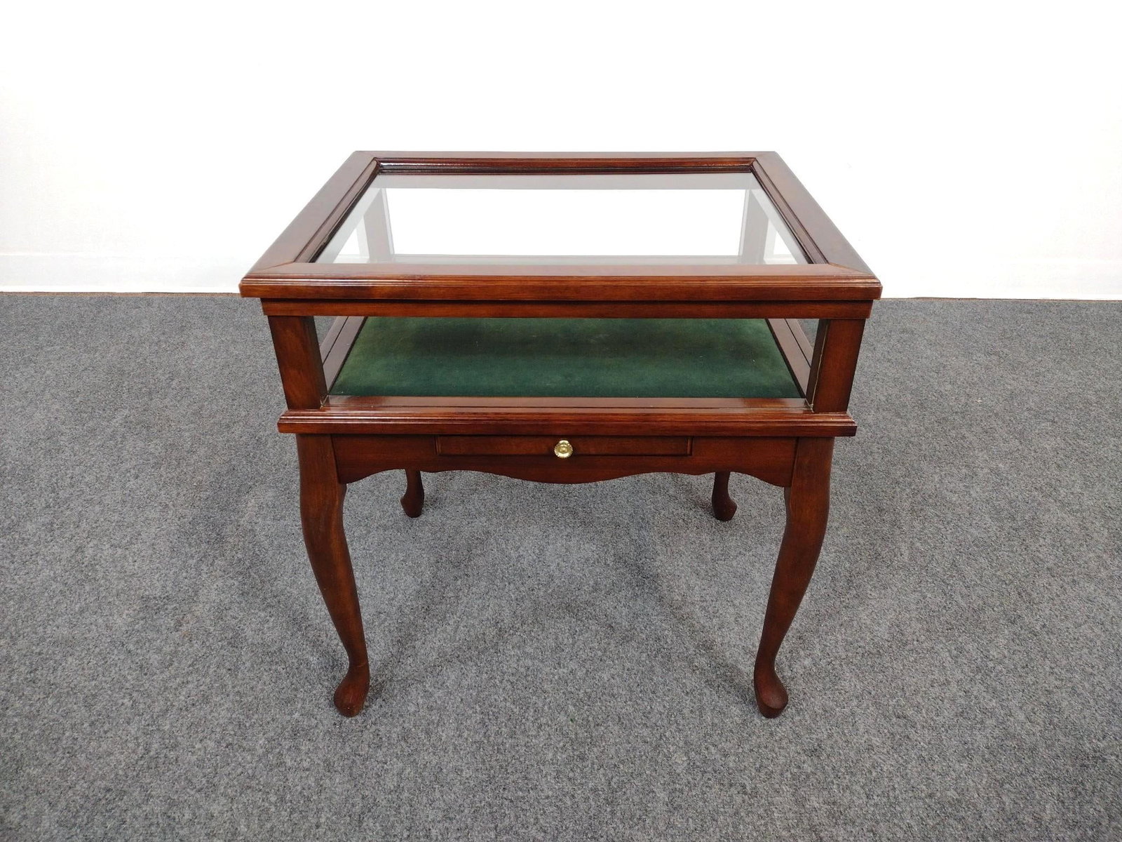 Curio Display End Table: 22-1/4" wide X 17-1/5" deep X 23-3/4" high. No manufactures name found.