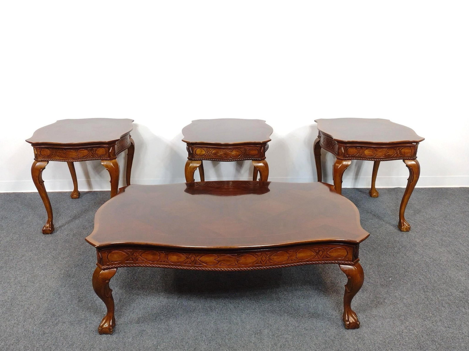 Chippendale Style Coffee & End Table Set: Coffee Table 50" wide X 31-1/2" deep X 18" high. End Tables 25-1/4" wide X 31-1/2" deep X 25" high. No manufactures name found.