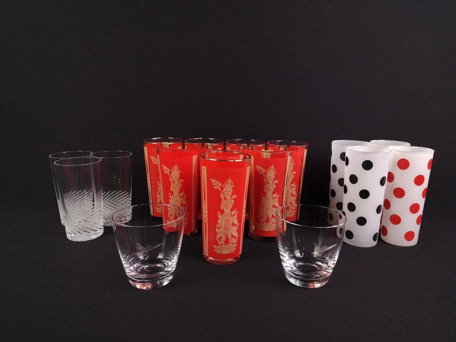 Vintage Glasses Incl. Fostoria: Includes 2 pairs of vintage polka dot frosted glass cups (2 - 3/4" x 2 - 3/4" x 6 - 1/2"), 3 Cristal D'Arques Durand Spiral cut glass cups (3" x 3" x 5 - 1/2", a pair of Ford Thunderbird Fostoria sign