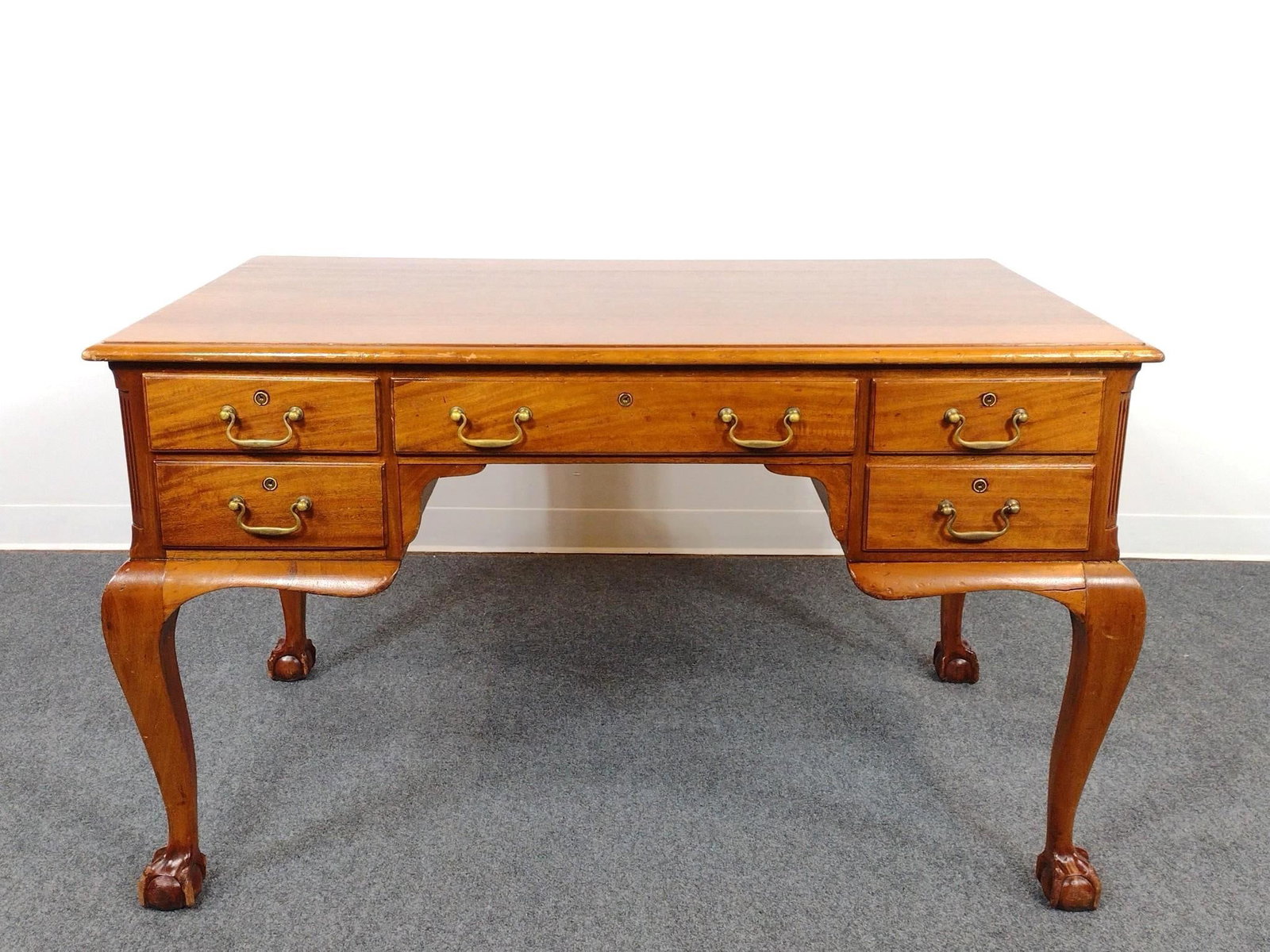 Chippendale Style Vintage Writing Desk: Ball and claw feet. 48-1/2" wide X 29-1/2" deep X 29" high. Has some light scratches.