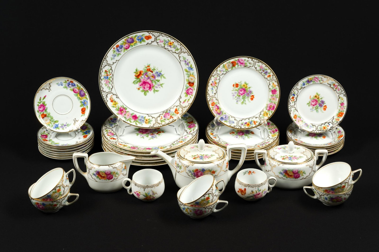 Rosenthal "The Dresden" Dinner Service: Dinner plate measures 10" and teacup measures 4" x 3" x 2 - 1/2".