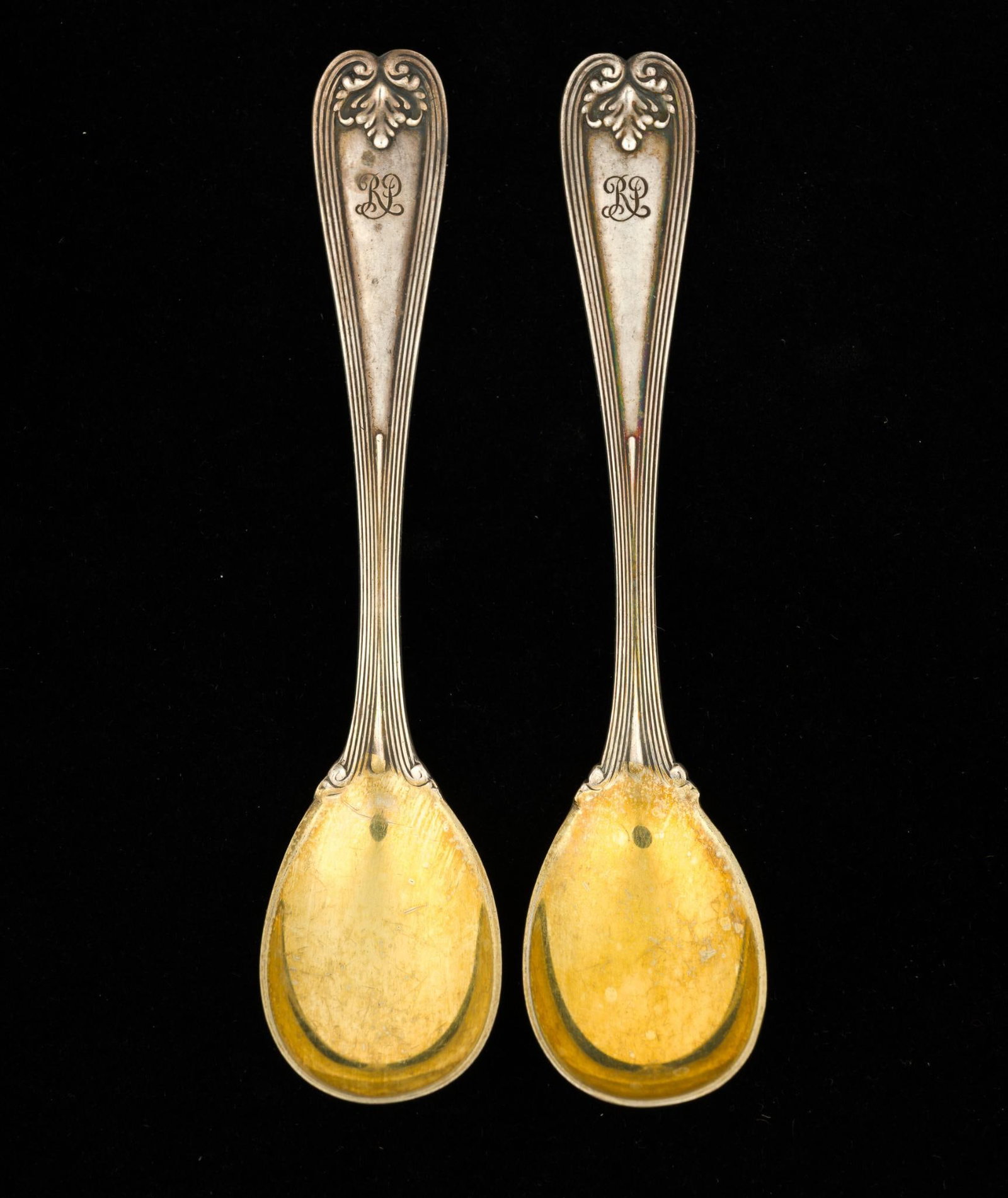 Pair of Tiffany Co. Sterling Silver Demitasse Spoons: 4 - 1/2" long, weight 1.16 ozt. Engraved "R.P." on the handle.