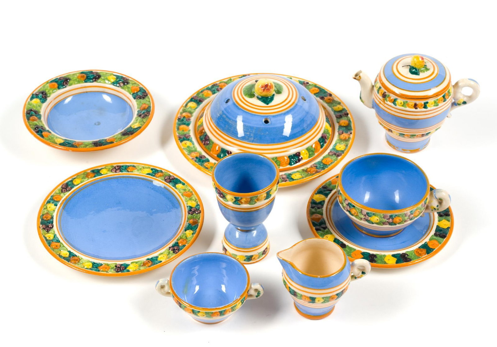 Della Robbia Style Servingware: Made in Italy. Creamer cup measures 3 - 1/2' x 2 - 1/2" x 2 - 3/4" and largest plate measures 8 - 1/4" in diameter.