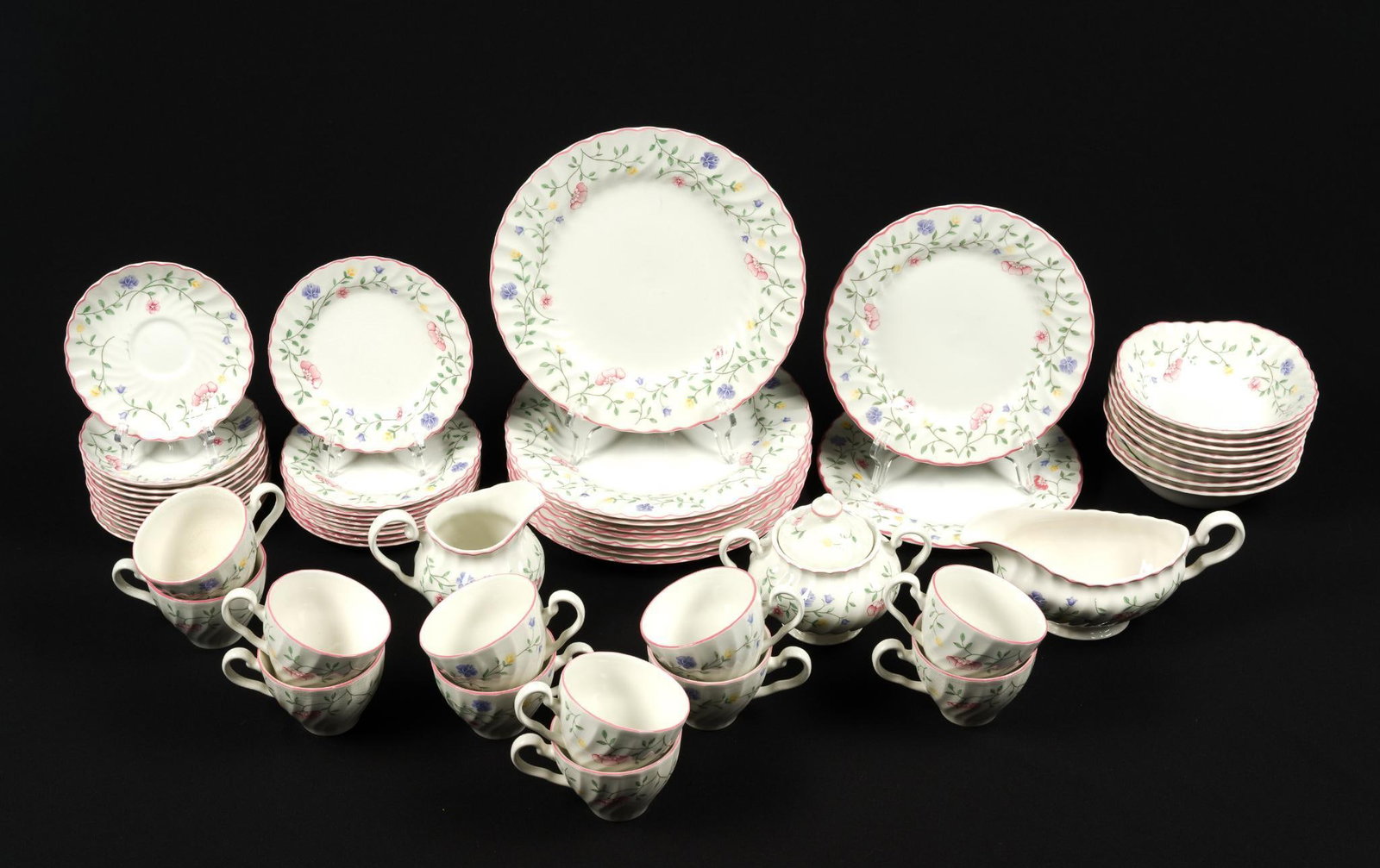 Johnson Bros. "Summer Chintz" Dinner Service: Made in England, dinner plate measures 9 - 3/4" in diameter, and teacup measures 4 - 1/2" x 3 - 1/2" x 2 - 1/2".