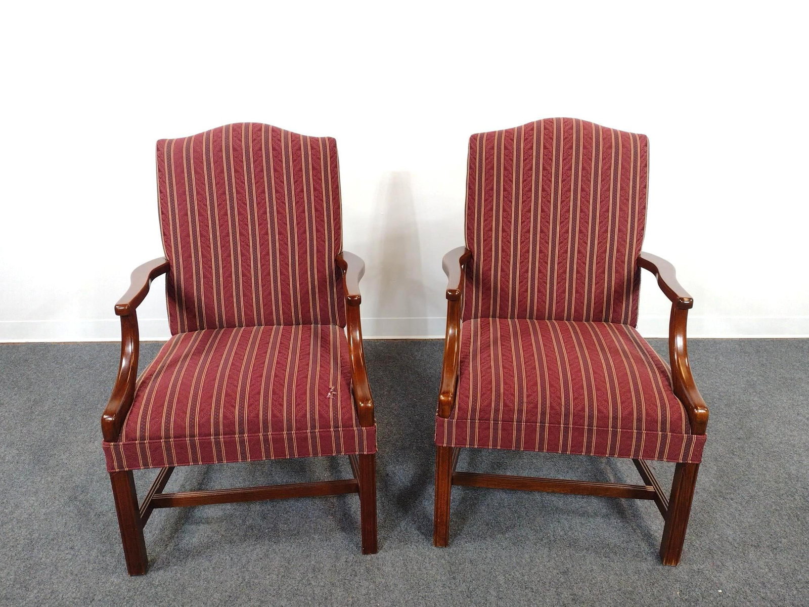 Pair of Upholstered Armchairs: Each 25-1/2" wide X 25" deep X 40-1/2" high. One has repair to back leg. The other Chair has hole on seat. No manufactures name found.