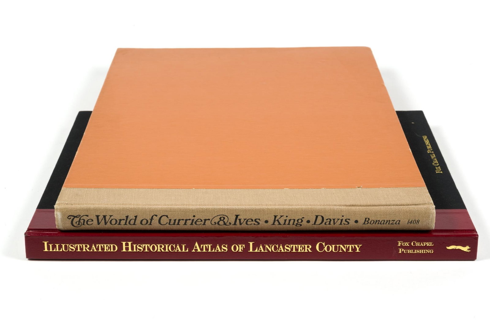 2 Coffee Table Books: Includes "The World of Currier & Ives" and the "Illustrated Historical Atlas of York County, PA." Currier & Ives book measures 14 - 1/4" x 19 - 1/4".
