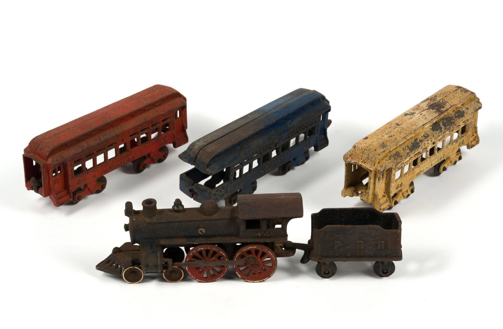 Vintage Cast Iron Pennsylvania Railroad Train Set: Locomotive measures 8 - 1/2" x 2" x 4" and the caboose measures 5" x 1 - 3/4" x 2 - 1/2".