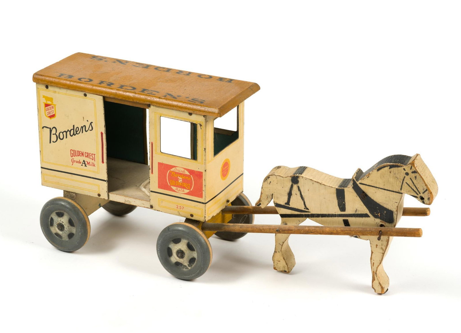 Rich Toys Borden's Horse-Drawn Milk Wagon Pull Toy: Measures 18" x 4" x 8".