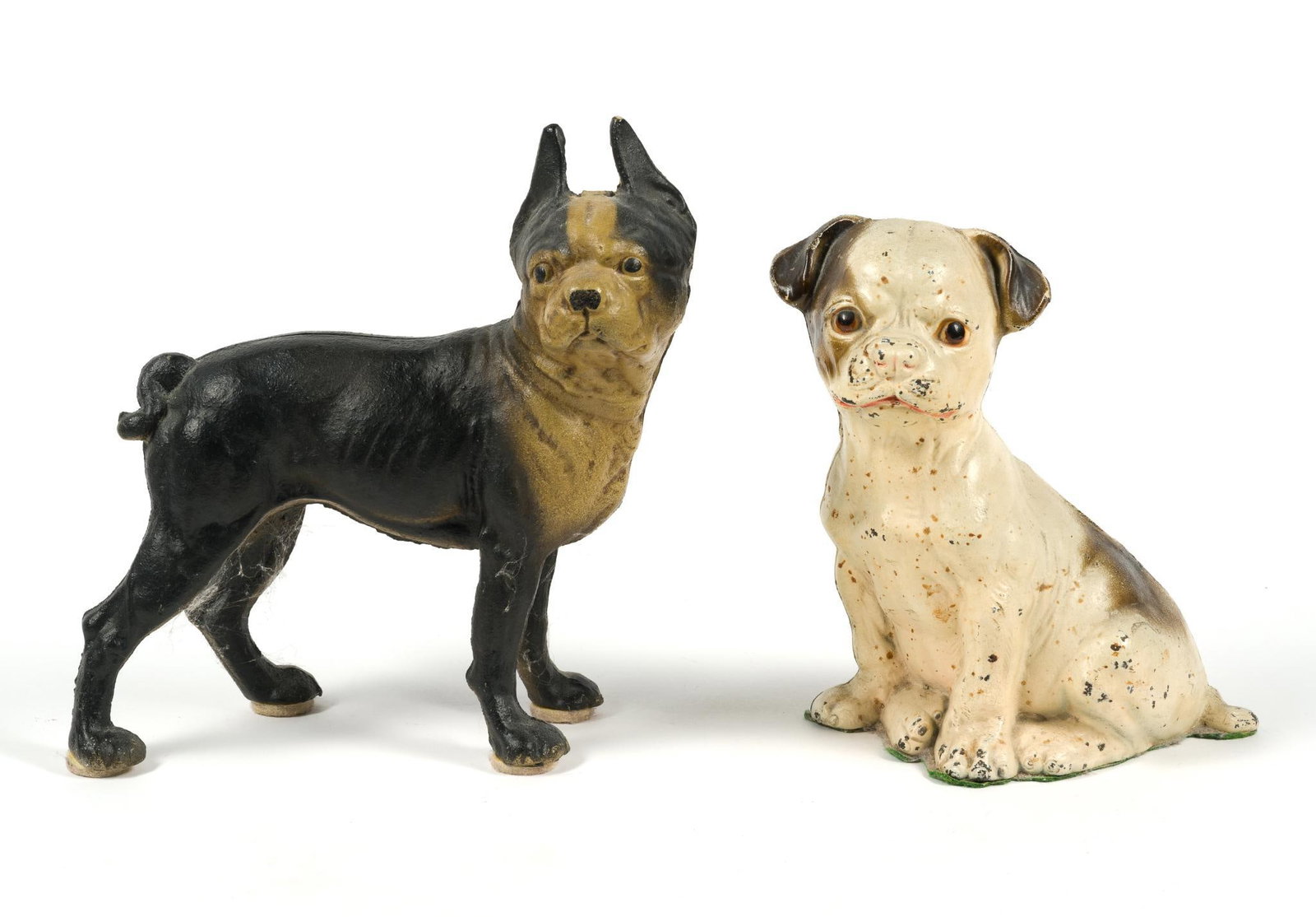 2 Vintage Cast Iron Door Stops: Larger dog measures 9" x 4" x 10".