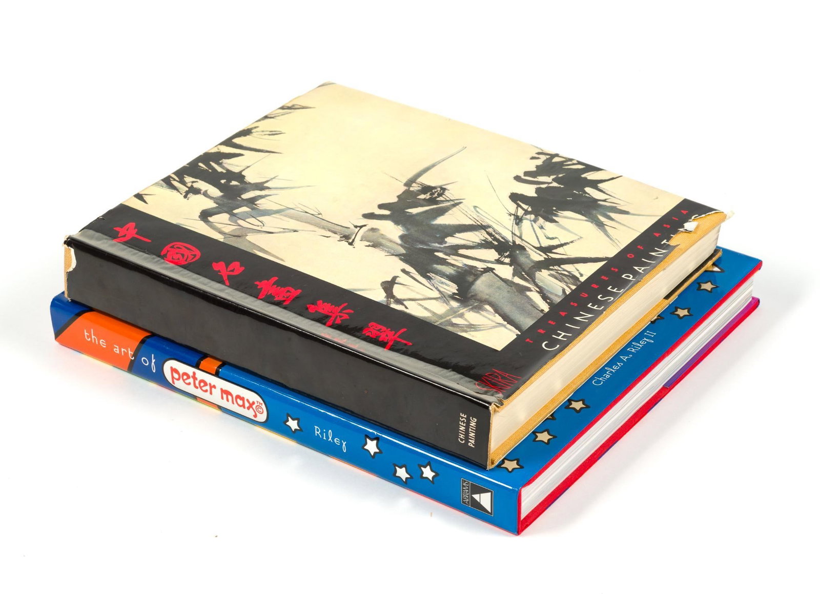 2 Coffee Table Art Books: Includes "Chinese Painting" from the Treasures of Asia series by James Cahill which measures 11" x 9 - 1/2", and "The Art of Peter Max" by Charles A. Riley II, which measures 12" x 10 - 1/4".