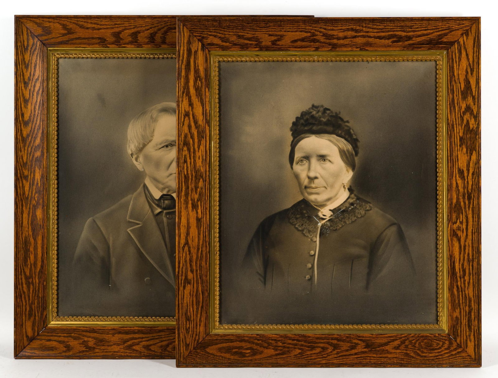 2 Framed Antique Portraits: Total measurement with frame is 30 - 7/8" x 27". Includes a copy of a document taped to the back of both frames that is written in German and outlines the history of the Bußmann family farm and its