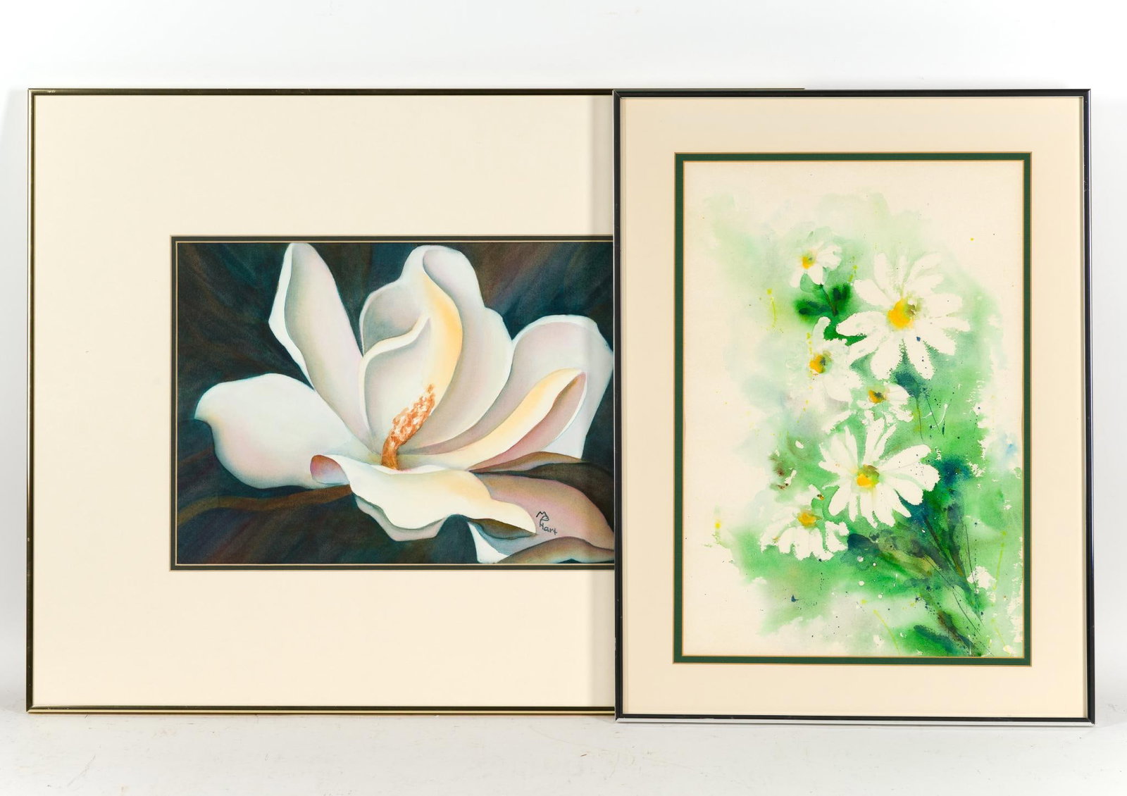 2 Framed Floral Art: 1) Marilyn Hart "Magnolia" 24 - 1/4" x 30 - 1/4" 2) Framed print of wildflowers based off of a watercolor. 24 - 1/4" x 18 - 1/4".