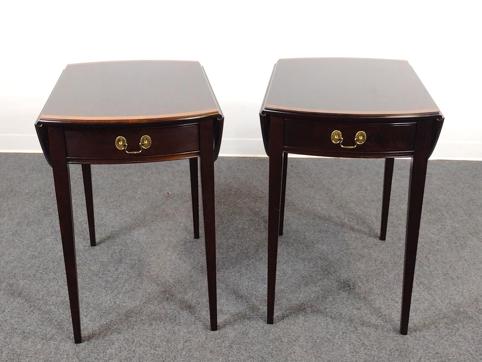 Pair Of Stickley Pembroke End Tables: Each. Open 36", closed 18" wide X 28" deep X 28" high. Both Table tops have some light scratches.