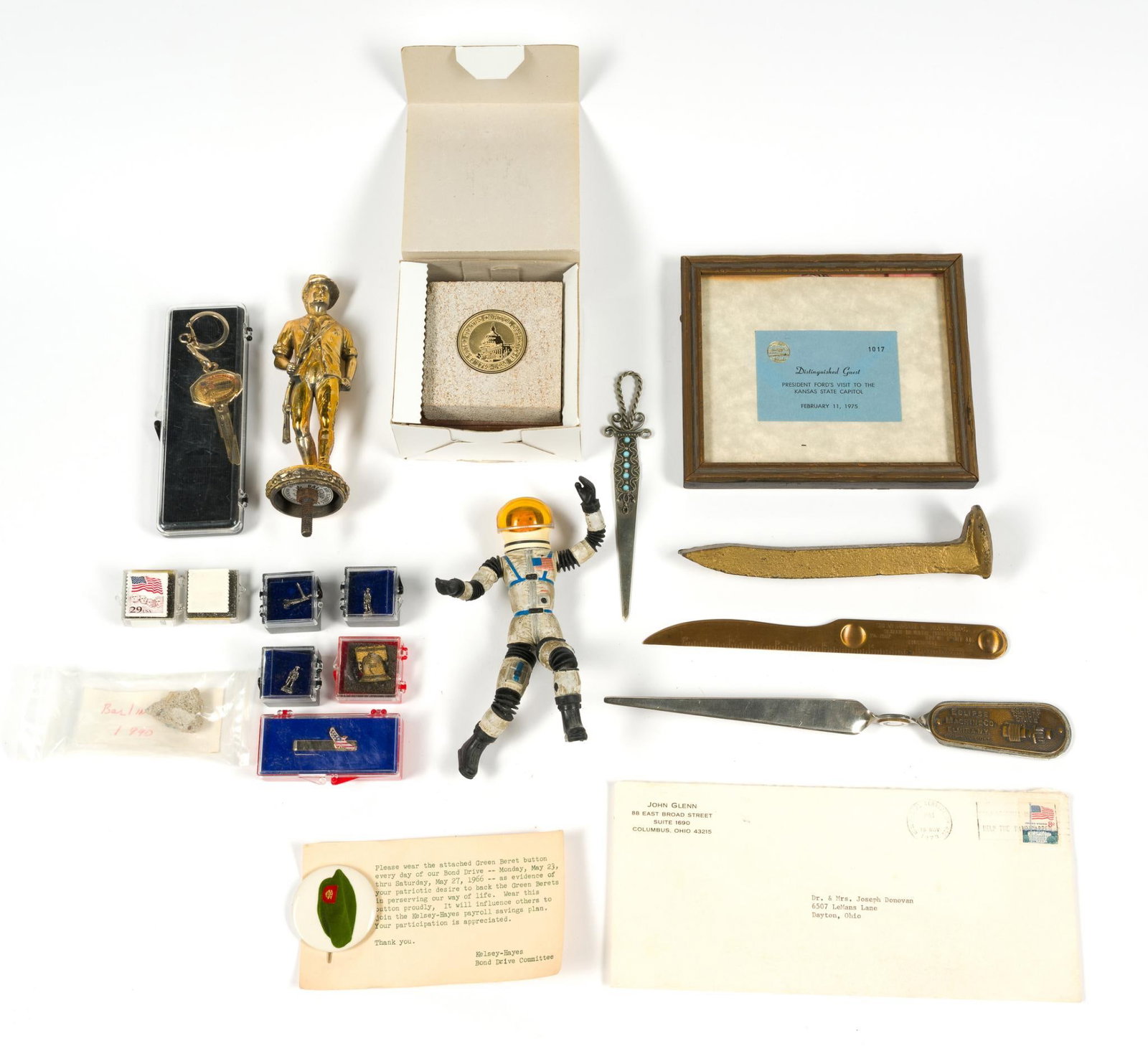 International Memorabilia & Souvenirs: Includes a letter from Astronaut John Glenn, a piece of the Berlin Wall, sandstone from congress and a toy astronaut among others. Largest letter opener measures 10" in length and the smallest boxes a