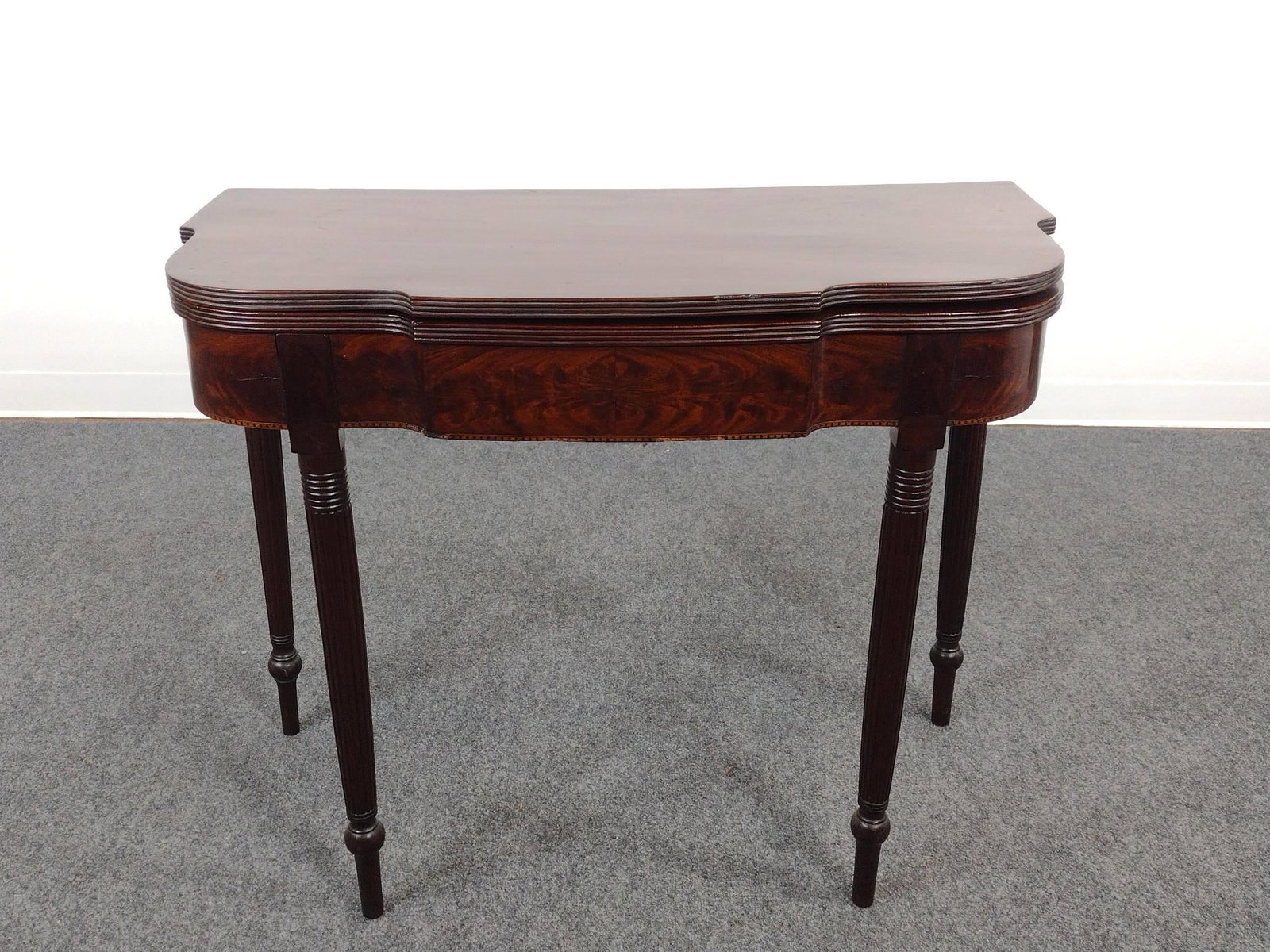 Sheraton Mahogany Game Table: Open 36-1/4" wide X closed 17-1/2", open 35" deep X 28-1/2" high. Has a few light scratches.