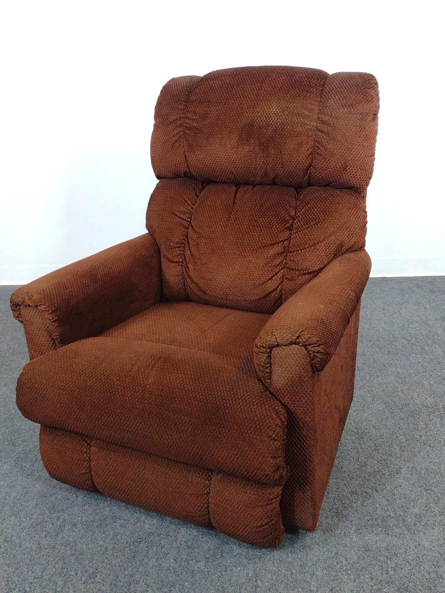 La-Z-Boy Recliner: 32" wide X 37" deep X 40" high. Headrest has some discoloring.