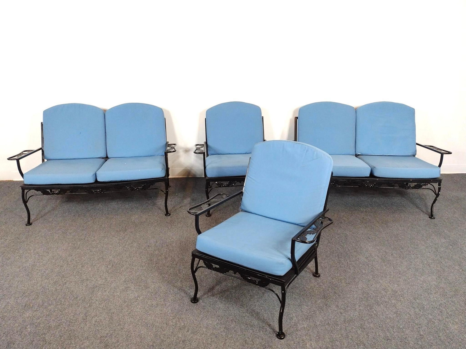 Vintage Four Piece Metal Outdoor Set: Settee 52" wide X 26" deep X 27" high. Arm Chair 30" wide X 26" deep X 27" high. All metal frames have some light wear. Some cushions have areas of discoloring