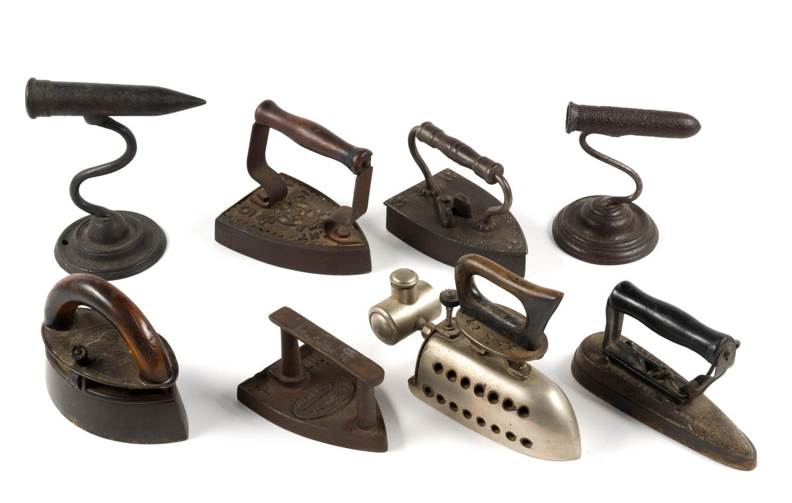 (Reconstruction Era) 8 Vintage Laundry Tools Incl. Sad Irons: From a private collection. Includes 6 flatirons and 2 "goffering" irons?or "fluting" irons, which were used in the 18th and 19th centuries to create pleats and ruffles in starched clothing.?Largest me