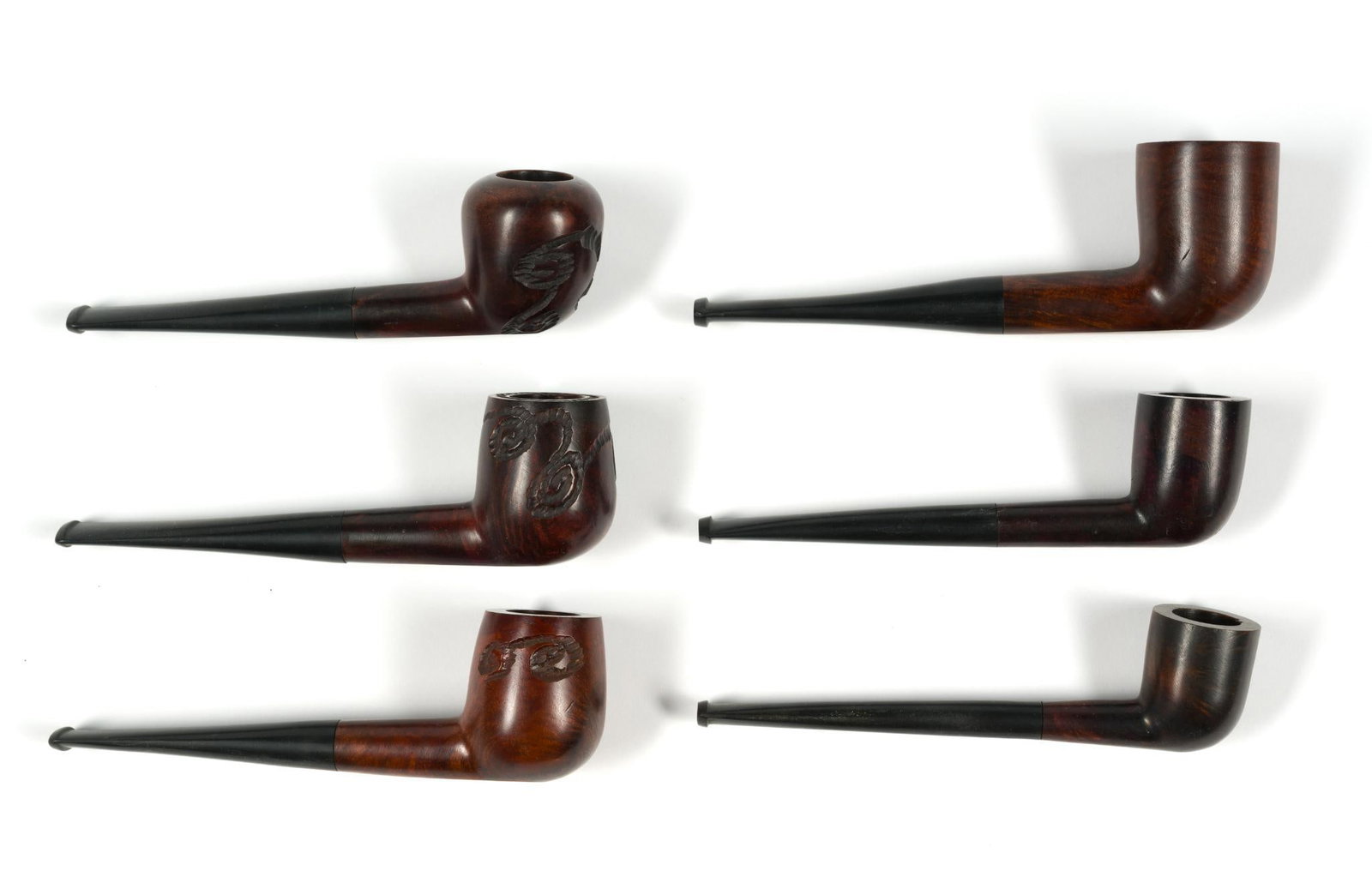 (Prohibition Era) 6 Antique Pipes: Some carved. 5-1/2" to 5-3/4" long.?PROVENANCE: M. Citkovich (Manufacturer of Meerschaum Pipes and Amber Goods, 53 Elm Place Amityville, NY).