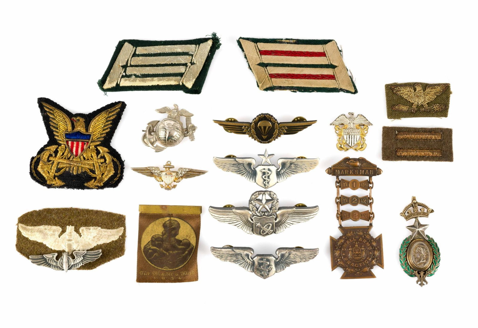 (WWII Era)16 Military Patches & Pins: Includes Officer Army Transport Service WWII patch; Command Astronaut Pilot Badge; Flight Surgeon badge; and more. 2-1/4" to 2-3/4" wide x 1" to 2-5/8" long.?