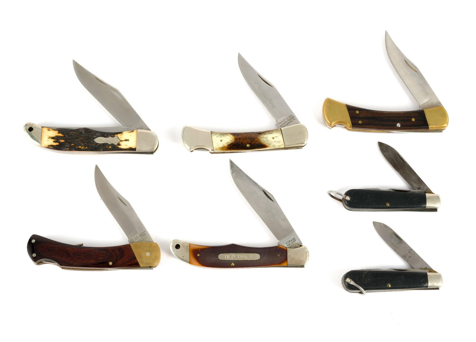 (Cold War Era) 7 Vintage Pocket Knives: Includes Schrade 1250T; Camillus; M-1481; Bear?MCG; and Buck. Opened 6-1/2" to 8-3/4" long. Closed 3-3/4" to 5" long.?