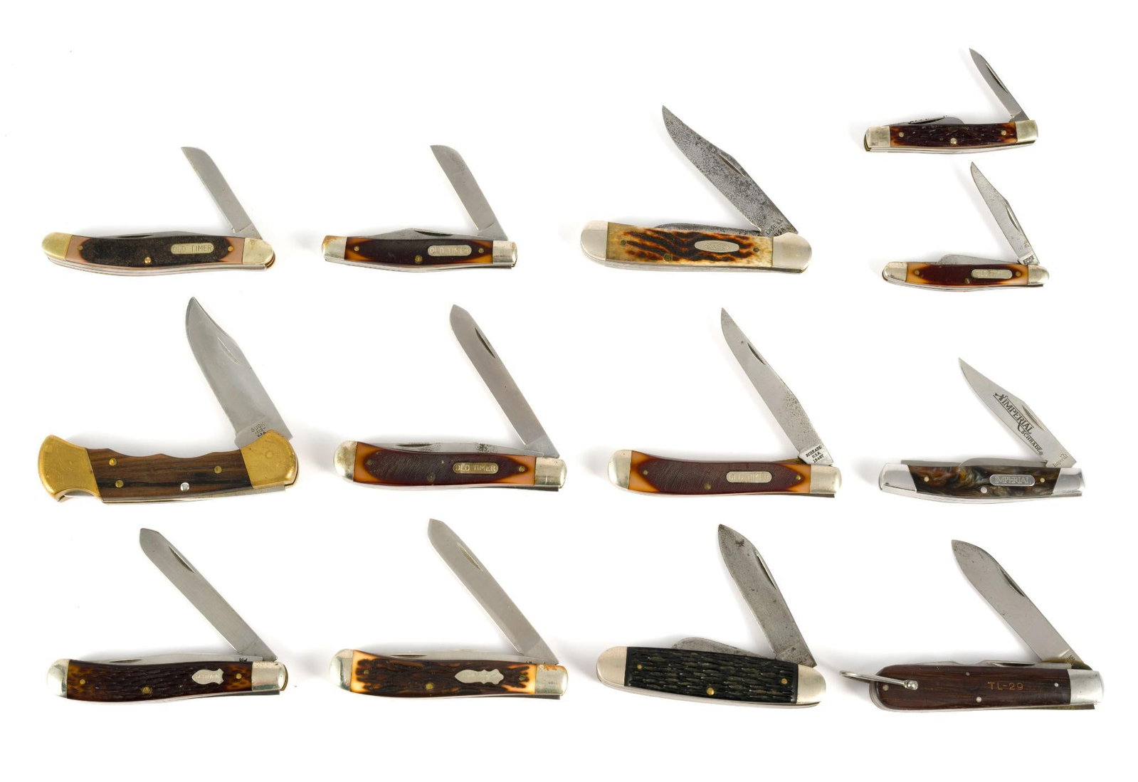 (Cold War Era) 13 Vintage Pocket Knives: Includes Buck; Schrade; Imperial; Camillus; and more. Opened 4-7/8" to 7-1/8" long. Closed 2-7/8" to 4-1/4" long.?